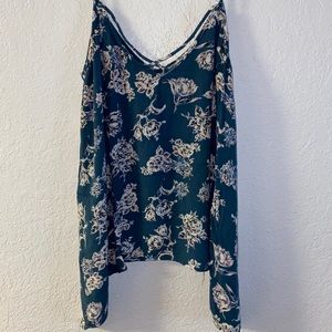 Asymmetrical floral tank top.